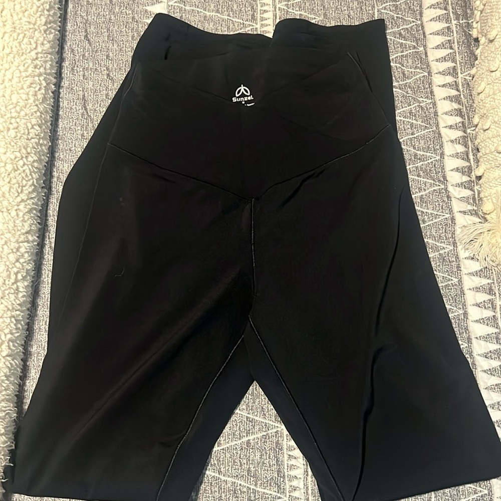 Black bell pants, cross waist band,  size medium